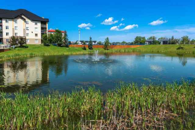 Downtown real estate 6204, 304 Mackenzie Way SW in Downtown Airdrie