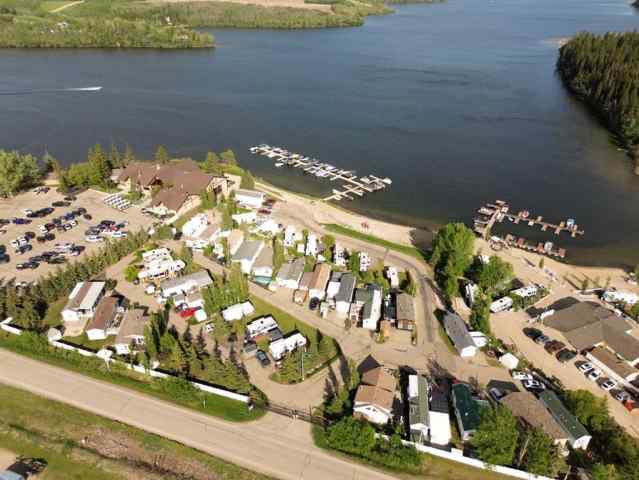 Whispering Pines real estate 2040, 25054 South Pine Lake Road  in Whispering Pines Rural Red Deer County