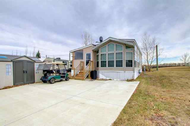 Whispering Pines real estate 5008, 25054 South Pine Lake Road  in Whispering Pines Rural Red Deer County