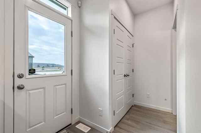 Just listed Pine Creek homes for sale new 918 Creekside Boulevard SW in Pine Creek Calgary