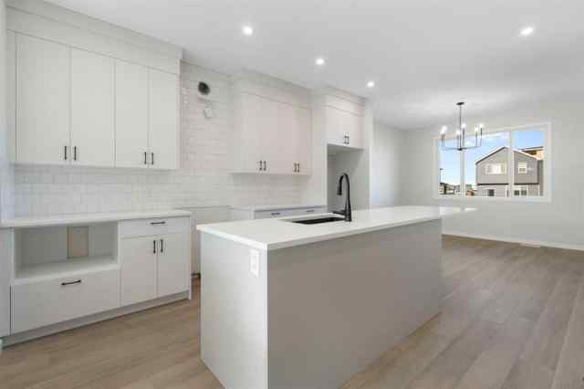 Just listed Pine Creek homes for sale new 13 Creekview Manor SW in Pine Creek Calgary