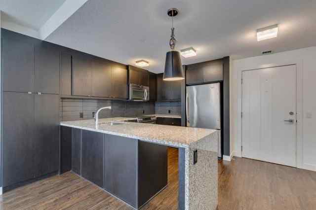 Just listed Aspen Woods homes for sale new 107, 25 Aspenmont Heights SW in Aspen Woods Calgary